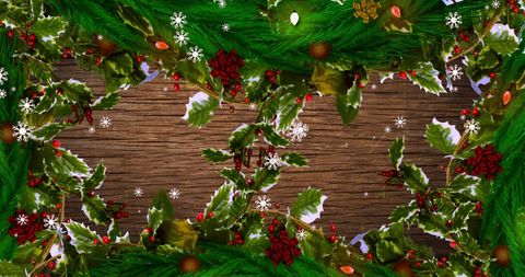 Festive Christmas Border with Snow and Leaves on Wooden Background