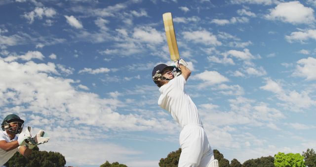 Batsman hitting cricket ball in motion on sunny day - Download Free Stock Images Pikwizard.com