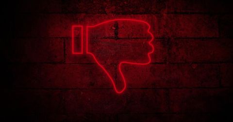 Illuminated Red Neon Dislike Symbol on Brick Wall - Download Free Stock Images Pikwizard.com