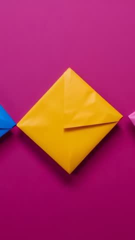 Yellow Envelope Drifting on Magenta in Vertical Motion Design with Color Accents