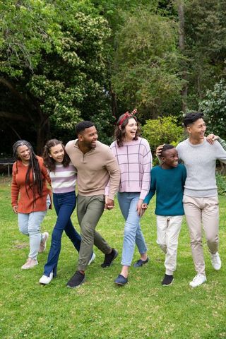 Diverse Family Enjoying a Walk in the Park Together