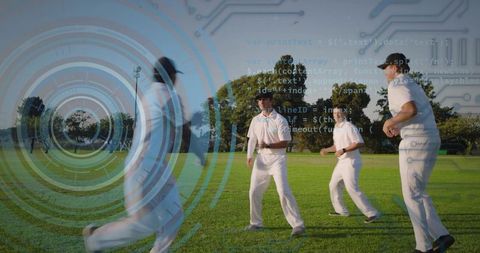 Cricketers fielding on sunlit grass wearing white kits with hud analytics overlay