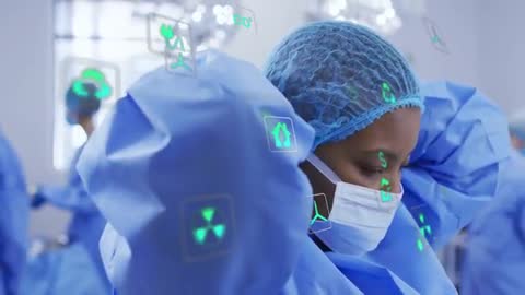 Surgeon Prepares with Futuristic Holographic Interface in Operating Room