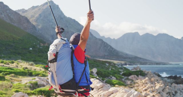 Adventurous Hiker Celebrating on Mountain Trail - Download Free Stock Images Pikwizard.com