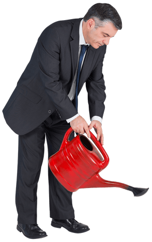 mature businessman watering imaginary plant transparent background - Download Free Stock Videos Pikwizard.com