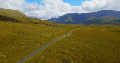 transparent road winding through scenic vivid landscape - Download Free Stock Videos Pikwizard.com