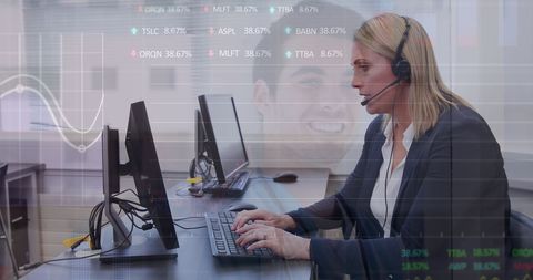 Businesswoman Analyzing Data with Headset in Contemporary Office - Download Free Stock Images Pikwizard.com