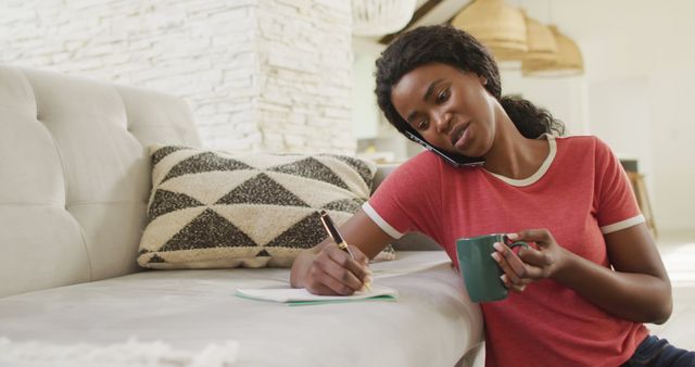 Woman Multitasking with Smartphone, Notebook and Coffee at Home - Download Free Stock Images Pikwizard.com