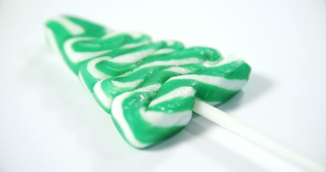 Christmas Tree Shaped Lollipop in Green and White - Download Free Stock Images Pikwizard.com