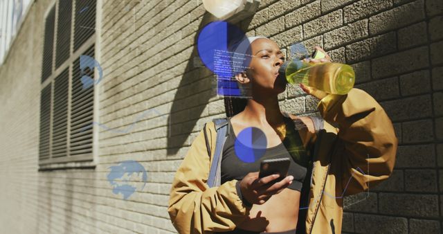 Fit African American Woman Drinking Water After Workout Checking Smartphone - Download Free Stock Images Pikwizard.com