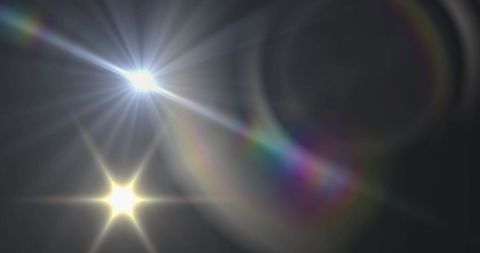 Prismatic Lens Flare with Radiant Light on Dark Background - Download Free Stock Images Pikwizard.com