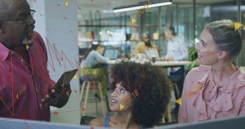 Collaborative team using digital tools in modern open-plan office