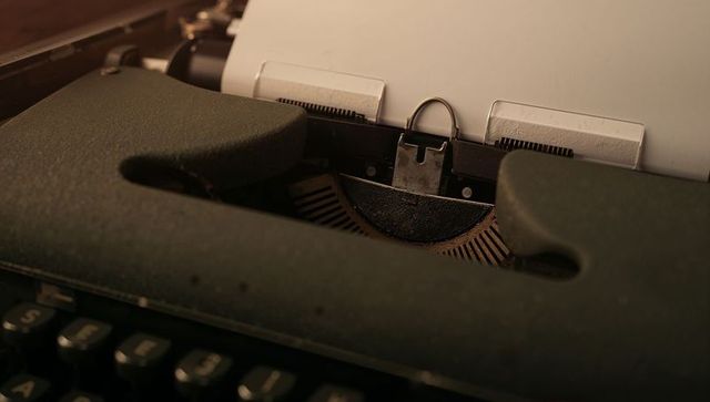 Vintage typewriter with blank page embracing nostalgia