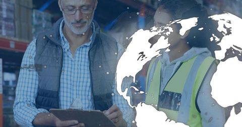 Logistics team analyzing warehouse shipment details on clipboard