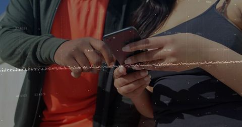 Collaborating on Smartphone with Digital Data Overlay and Closeup Hands Interaction