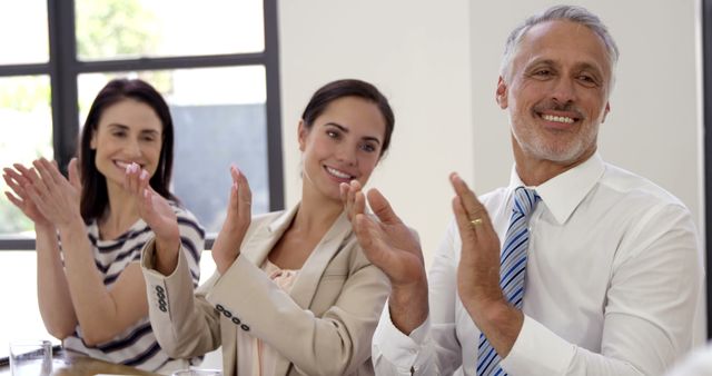 Business Colleagues Applauding at Corporate Meeting - Download Free Stock Images Pikwizard.com