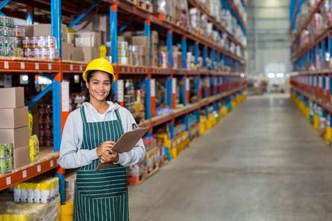 Hispanic Female Warehouse Worker Managing Inventory with Clipboard - Download Free Stock Images Pikwizard.com