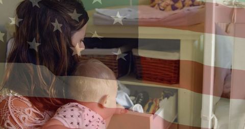 Mother and baby bonding time against usa flag backdrop