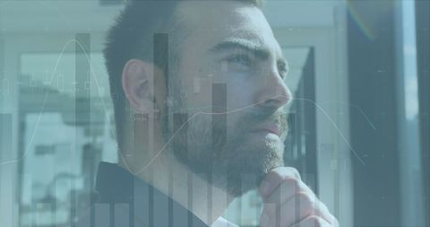 Contemplating Businessman Analyzing Digital Data Interface