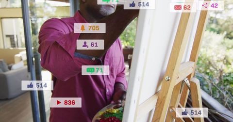 African American Artist Engaging with Social Media at Home