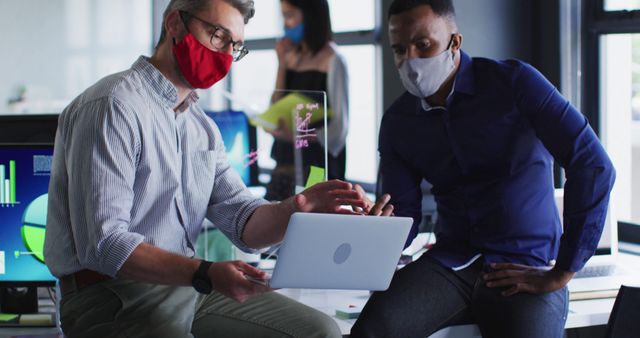 Diverse Colleagues Collaborating in Modern Office with Masks - Download Free Stock Images Pikwizard.com