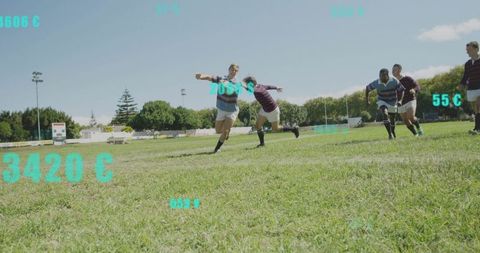 Rugby player evading tackle on sunlit grass with augmented reality performance overlays