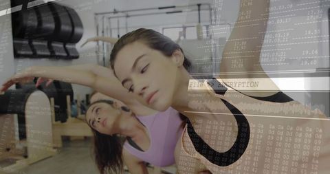 Women practicing pilates in studio with technology overlay