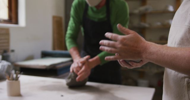 Potters Creating Artisanal Ceramics in Studio - Download Free Stock Images Pikwizard.com