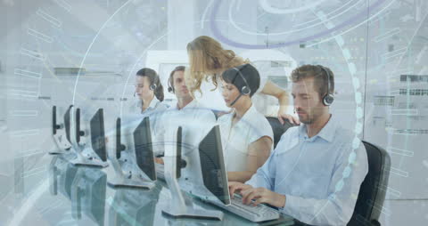 Diverse Team with Headphones Collaborating in Modern Office