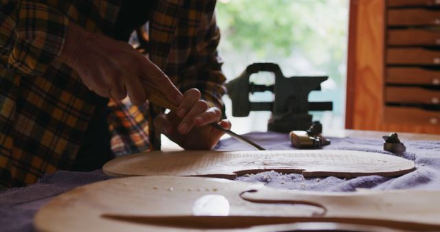 Luthier Crafting Violin Body in Point of View Angle - Download Free Stock Images Pikwizard.com