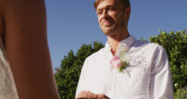 Groom Holding Hands during Outdoor Wedding Ceremony - Download Free Stock Images Pikwizard.com