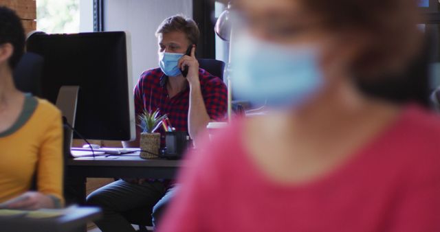 Employees in Open Office Wearing Face Masks and Working - Download Free Stock Images Pikwizard.com