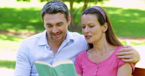 Happy Couple Enjoying Book on Park Bench - Download Free Stock Images Pikwizard.com