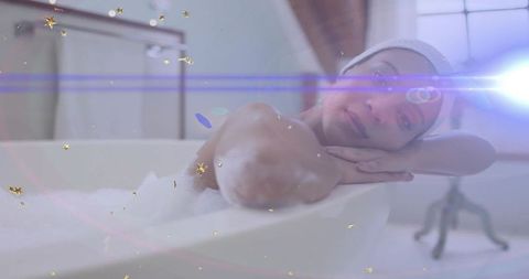Woman Enjoying Relaxation Soak in Clawfoot Tub
