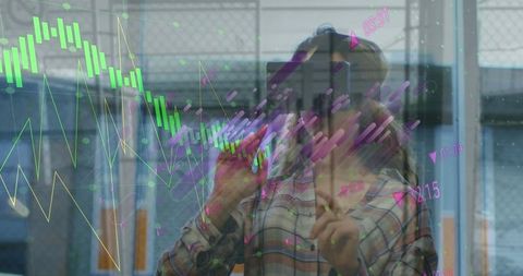 Businesswoman Engaging with Interactive Digital Finance Graphs