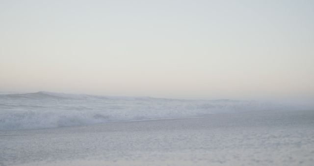 Serene Early Morning Beach with Gently Rolling Waves - Download Free Stock Images Pikwizard.com