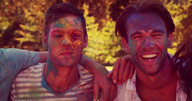 Friends Enjoying Holi Festival with Colorful Powder on Faces - Download Free Stock Images Pikwizard.com