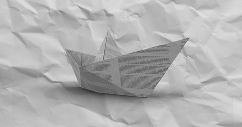 Origami Paper Boat on Crumpled Background for Creativity Concept - Download Free Stock Images Pikwizard.com