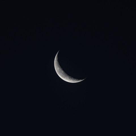 Captivating Crescent Moon Against Midnight Sky