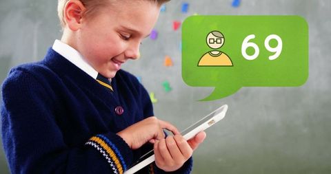 Boy in School Uniform Using Tablet for Educational Activities