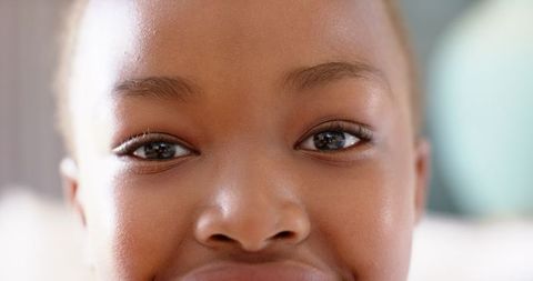 Close-Up Portrait of Joyful Smiling Child