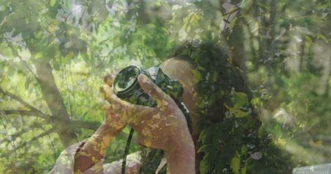 Female Photographer Capturing Nature in Forest Setting