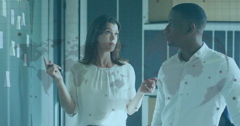 Diverse Colleagues Analyzing Global Business Strategy with Infographic Overlay