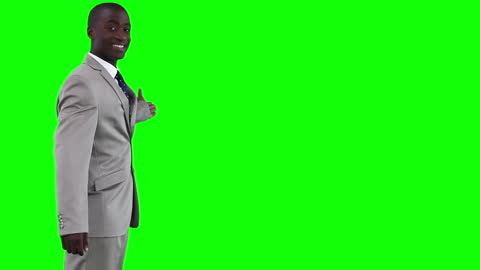 Smiling Businessman Pointing to Innovative Green Screen Space