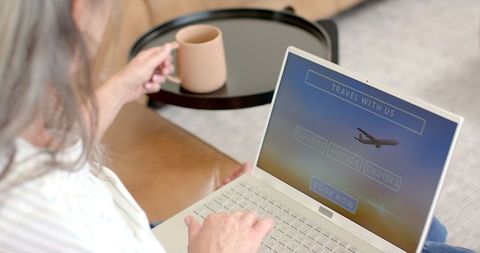 Mature Woman Planning Trip Online from Home - Download Free Stock Images Pikwizard.com