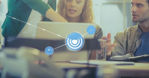 Team Collaboration with Digital Connectivity in Modern Office