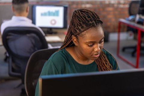 Professional team working collaboratively in modern office environment