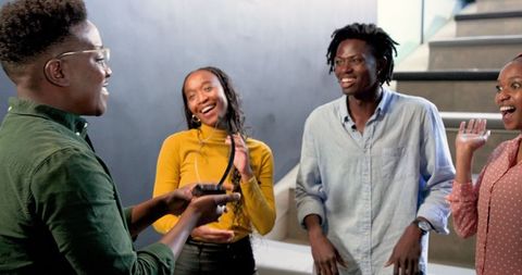 Diverse Team Engaging in Memorable Office Meeting