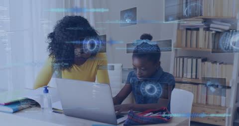 Mother and Daughter Using Laptop for Education at Home