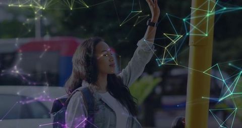 Urban Mobility with Smart Tech: Asian Woman Pressing Crossing Button